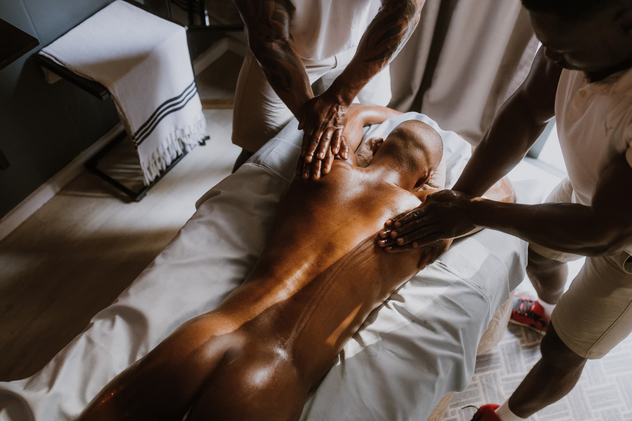 Spa therapist team in professional treatment setting