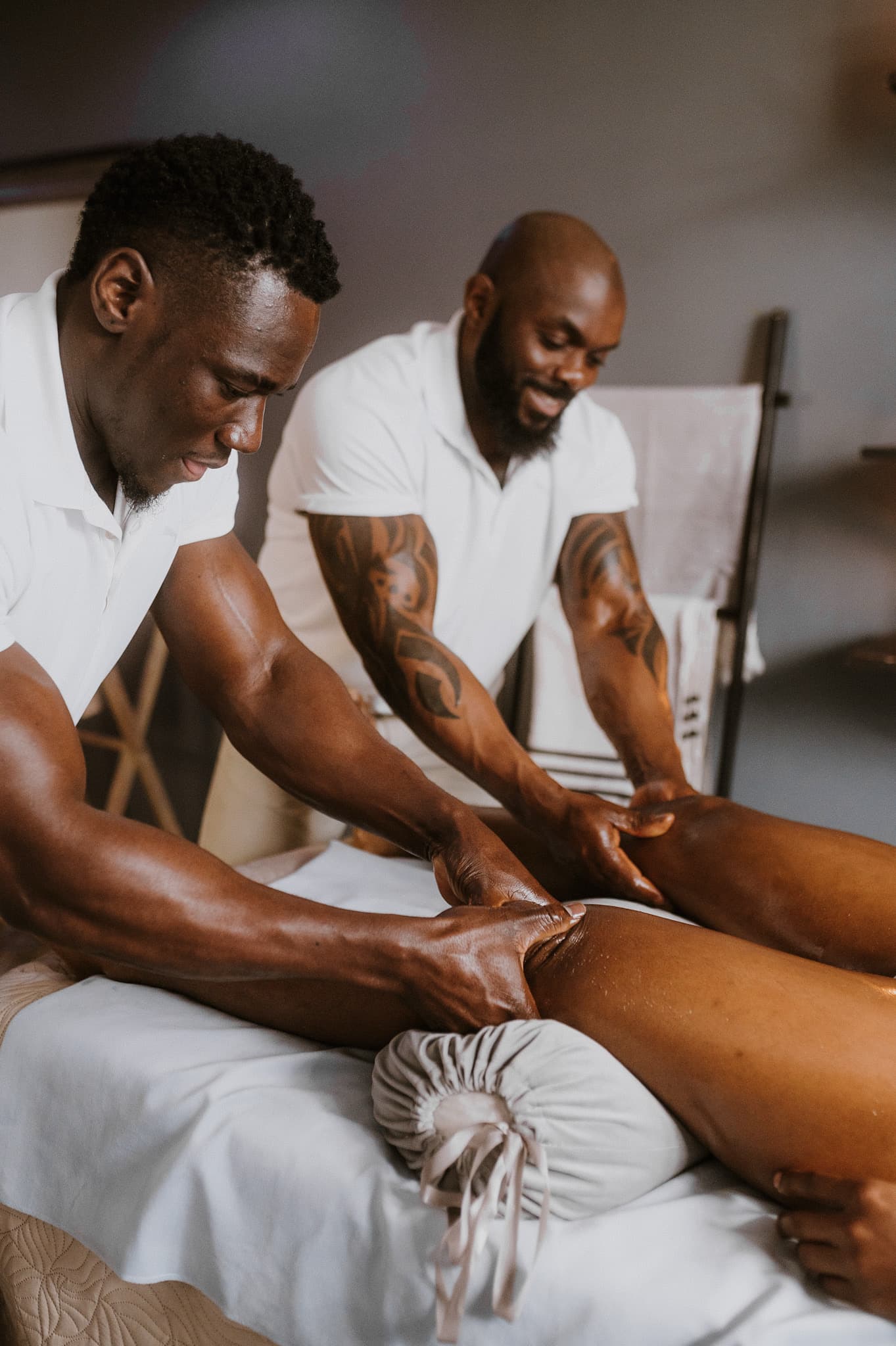 Relaxed spa client experiencing luxury wellness treatment